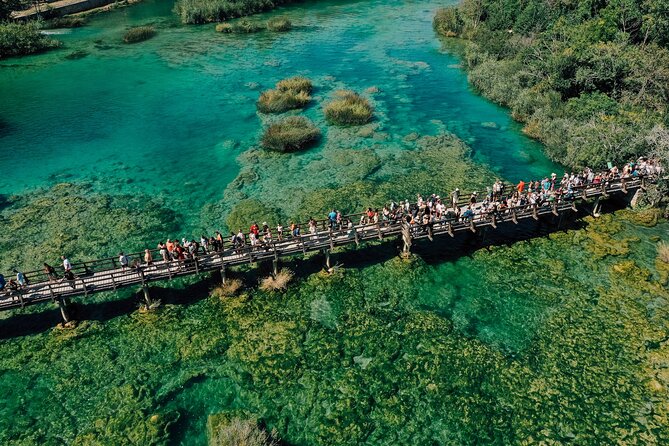 From Split: Krka Waterfalls Tour, Boat Cruise & Swimming - Krka National Park and the wooden paths