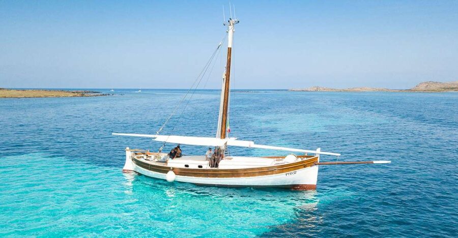 From Stintino: Asinara Vintage Sailing Boat Tour with Lunch - Cala Reale: donkeys, quarantine buildings, and a Roman wreck