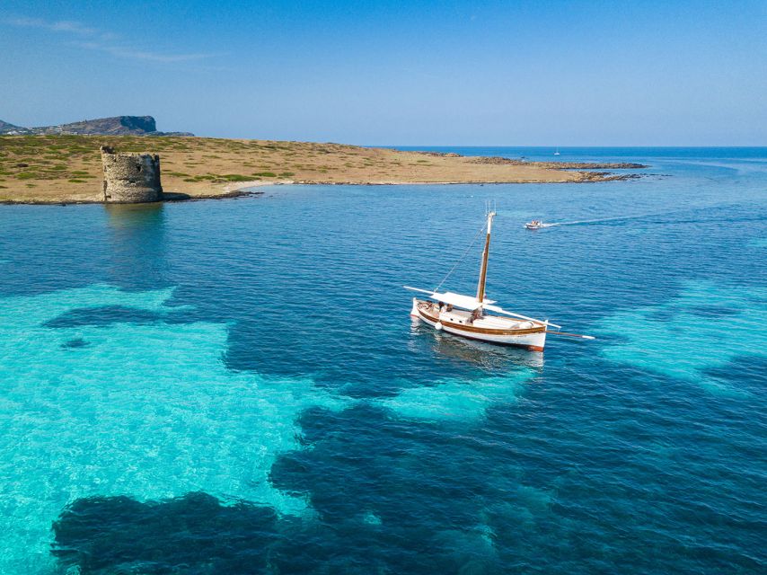 From Stintino: Asinara Vintage Sailing Boat Tour with Lunch - Cala d’Oliva and Asinara’s prison past