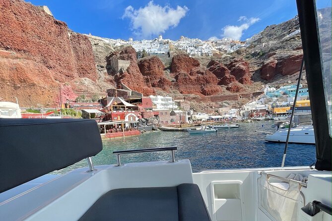 Half Day Premium Catamaran Cruise in Santorini including Oia - Oia and Ammoudi Bay depend on the schedule