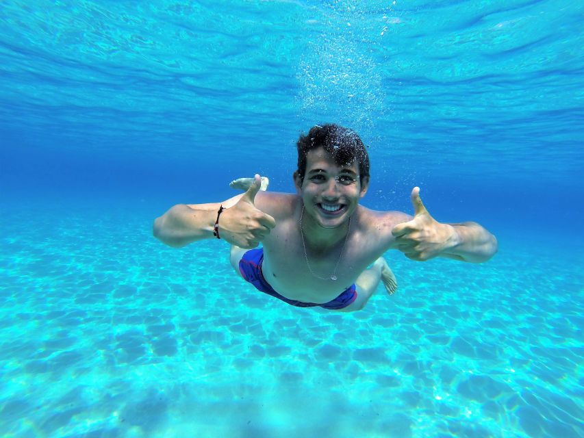 Ibiza: Snorkeling and SUP Paddle, Beach and Cave Boat Tour - Drinks, music, and the onboard mood