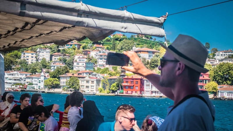 Istanbul: Bosphorus Sightseeing Cruise Tour with Audio Guide - Tea, seating, and the sunset choice