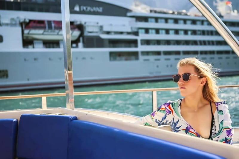 Kotor Bay: Full-Day Catamaran Cruise with Blue Cave Visit - Leaving Kotor and crossing the bay