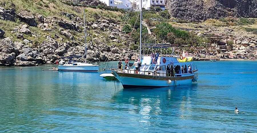 Lindos: Rhodes South-East Coast Cruise with Swim Stops - Kamares Pirate Caves is the memorable stop