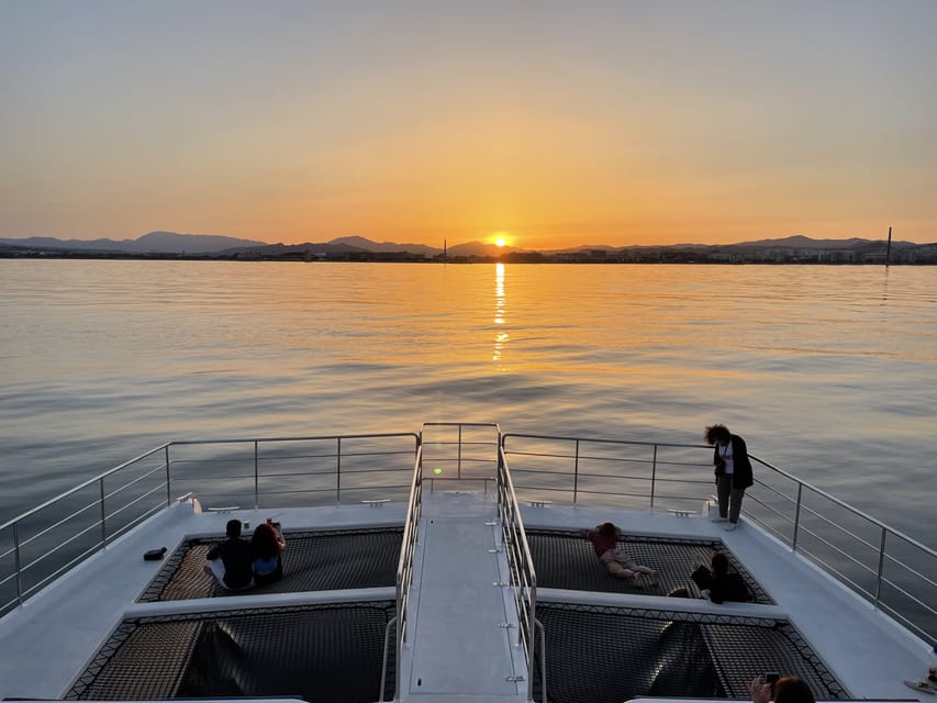 Málaga: Sunset Catamaran Trip - Cruising past Málaga as the light changes