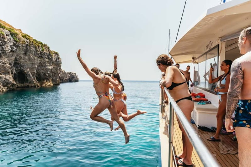 Malta: Blue Lagoon, Beaches & Bays Trip by Catamaran - Music, cocktails, and the mood onboard
