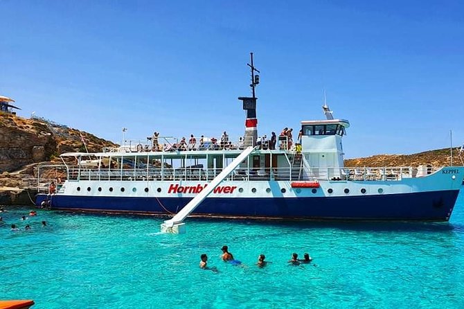 Malta: Comino, Blue Lagoon & Caves - swim, snorkel & slide - How crowded and lively is the boat?