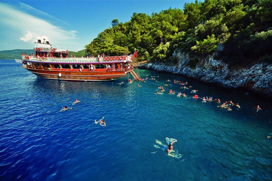 Marmaris: Boat Trip with Unlimited Drinks and BBQ Lunch - Kumlübük, Amos, and Green Sea