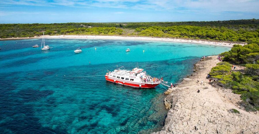 Menorca: Full-Day Boat Tour with Paella Lunch - Son Saura brings another 90 minutes by the water