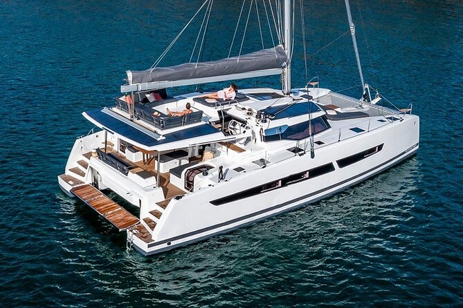 Mykonos: Brand-New Catamaran Cruise with Meal, Drinks & Transport - Delos is a passing view, not a full archaeological visit