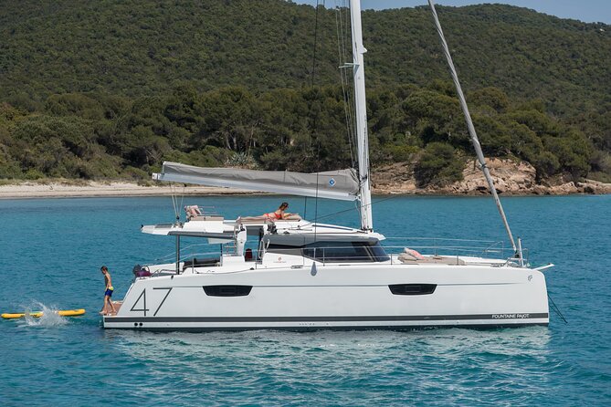 Mykonos: Brand-New Catamaran Cruise with Meal, Drinks & Transport - Lunch on board makes the price easier to justify