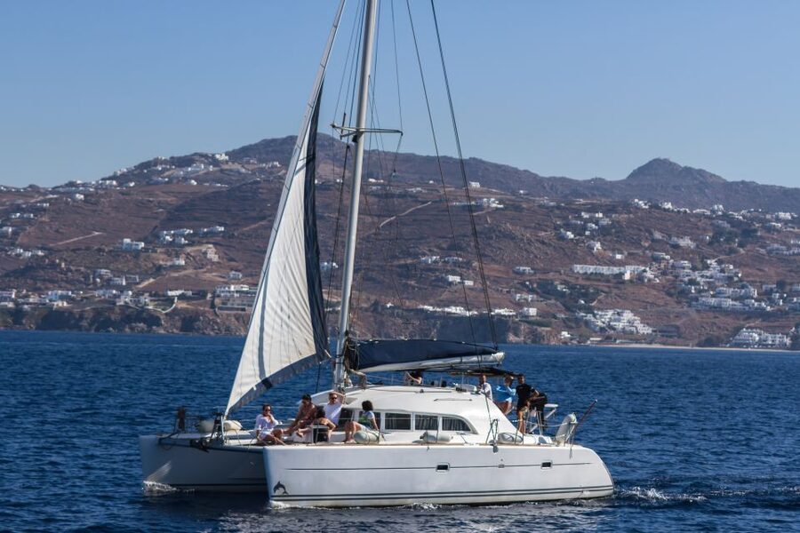 Mykonos: Catamaran Cruise With Meal and Drinks - From hotel pickup to Mykonos New Port