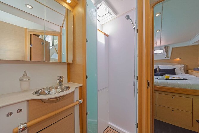 Mykonos Catamaran Premium Day-Sunset Tours 8-flavor Meal & Drinks - Crew service and comfort on board