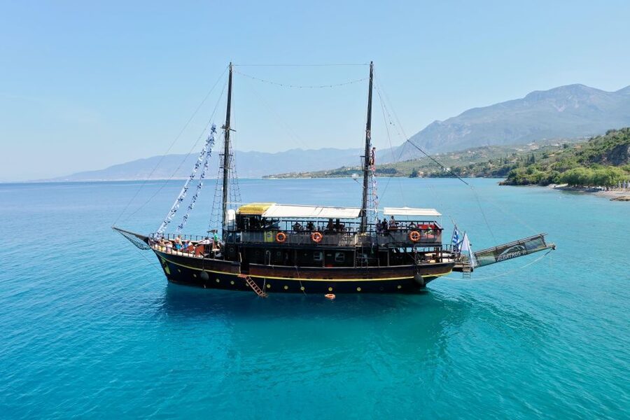 Mykonos: Sunset Party Boat Cruise with 1 Drink - Cruising the north coast on a wooden boat