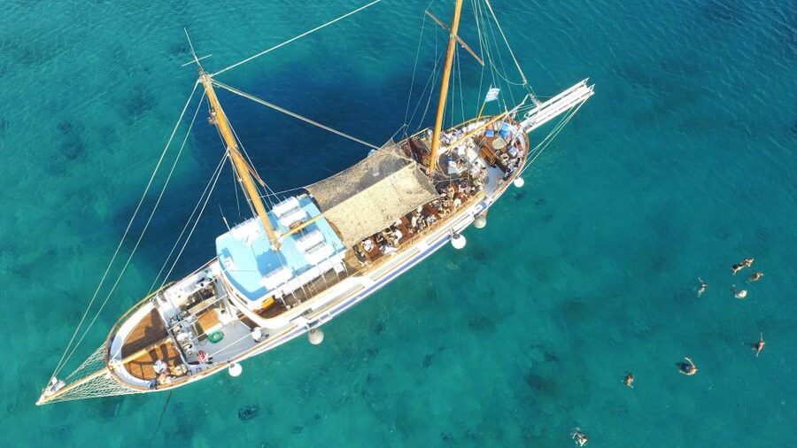 Mykonos: Sunset Party Boat Cruise with 1 Drink - The Agios Stefanos swim stop
