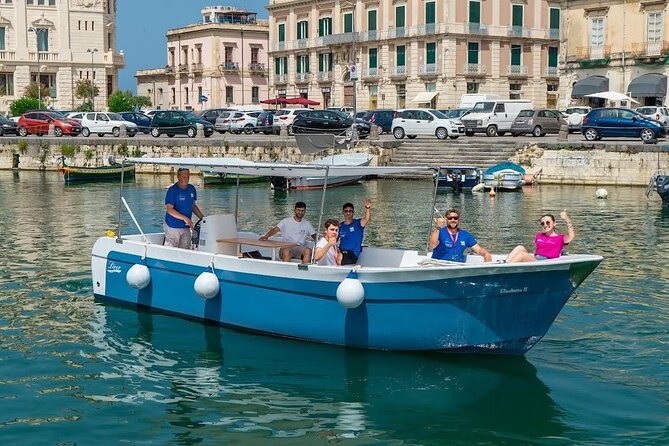 Ortigia Island and Sea Caves Boat Tour with Prosecco - Commentary and the English-language question