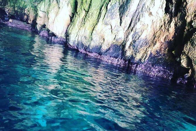 Ortigia Island and Sea Caves Boat Tour with Prosecco - Sea caves and the unusual route under a bridge