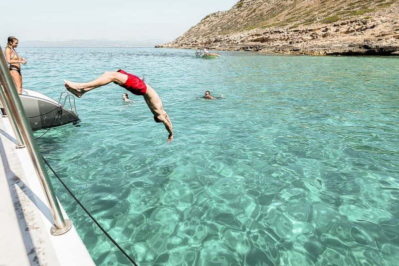Palma de Mallorca: Half-Day Catamaran Tour with Buffet Meal - Daytime cruise or sunset sailing