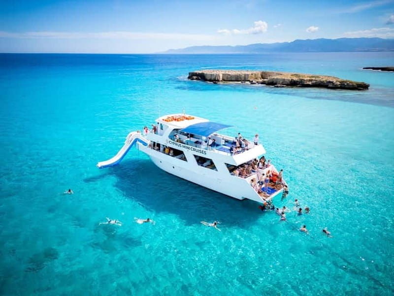 Paphos/Akamas: Blue Lagoon Bus & Boat Tour with Water Slide - The boat ride from Latchi