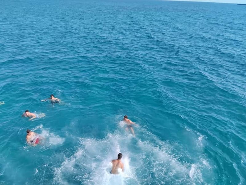 Paphos: Glass Bottom Boat Trip with Swimming or Snorkeling - The crew and the feel on board