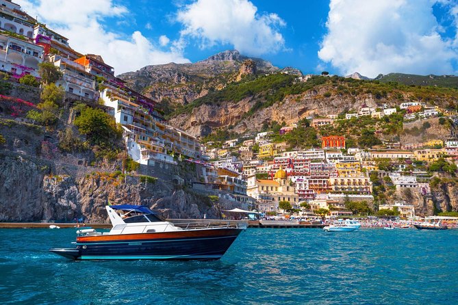 Positano & Amalfi Boat Tour from Naples with Light Lunch - Roman ruins at Bagni della Regina Giovanna