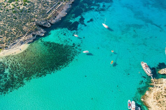 Private Boat Tour: Crystal Lagoon, Blue Lagoon, Comino and Gozo - Blue Lagoon: famous water, busy setting