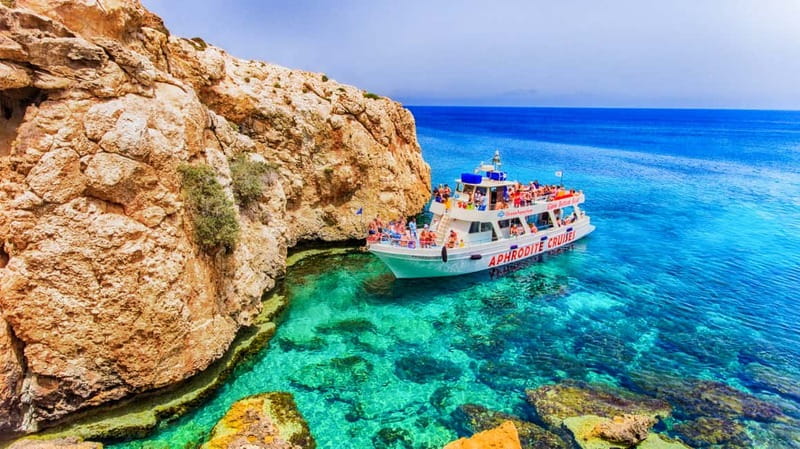 Protaras: Turtle Cove & Blue Lagoon Cruise - Leaving Protaras Pier and passing Famagusta
