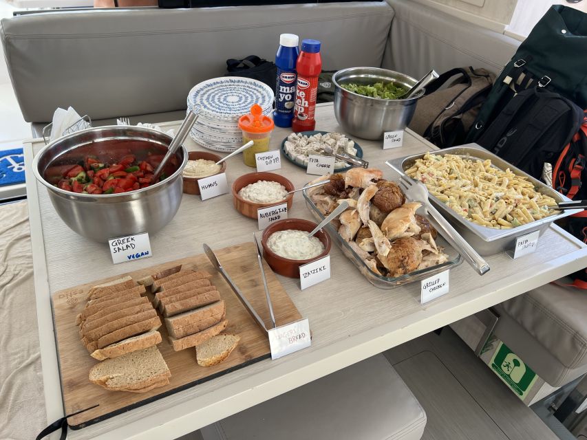 Rhodes: All-Inclusive Catamaran Cruise with Lunch and Drinks - Lunch onboard: simple Greek food that suits a day at sea