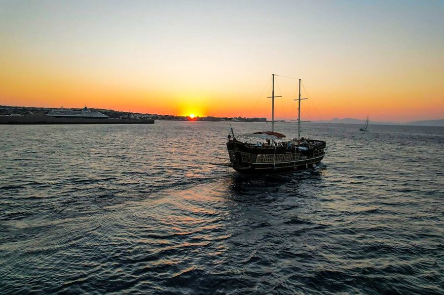 Rhodes: Sunset Cruise with Greek BBQ and Unlimited Drinks - Greek BBQ, cocktails, and the return sail