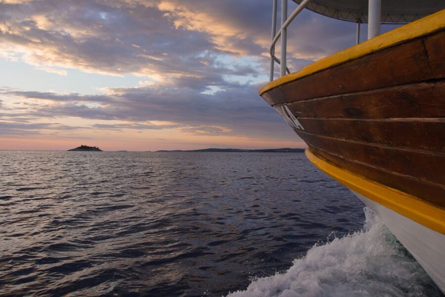 Rovinj: Sunset Boat Trip with Dolphin Watching - Passing Rovinj Island and the nearby islets