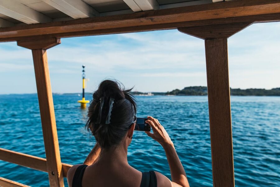 Rovinj: Sunset Cruise with Swim Stop, Drinks, and Fruits - Swimming, jumping, and clear water between the islands