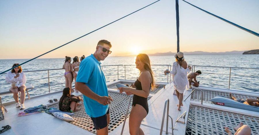 S'Arenal: Sunset Catamaran Cruise with BBQ - Cap Enderrocat and Cala Vella by boat