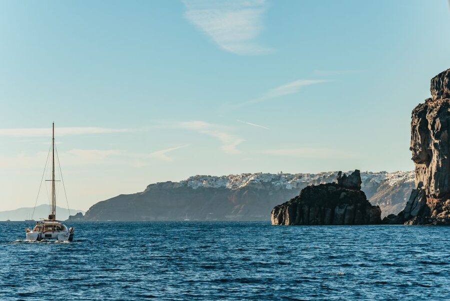 Santorini: Catamaran Caldera Cruise with Meal and Drinks - A hot Greek meal served on the water