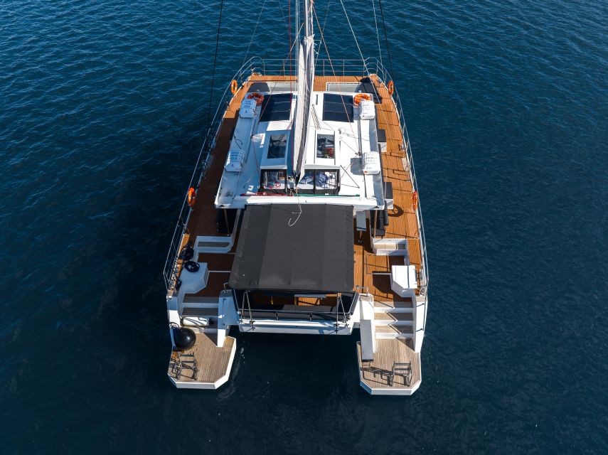 Santorini: Catamaran Caldera Cruise with Meal and Drinks - Choosing between the Ammoudi day cruise and Vlychada sunset cruise