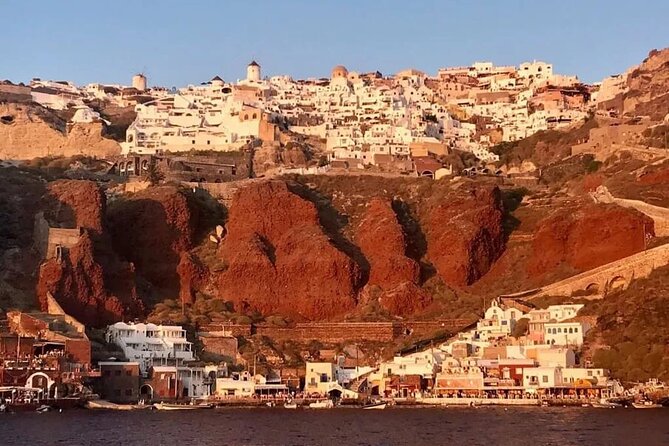 Santorini Catamaran Cruise with Greek Meal, Open-Bar and Sunset - The luxury route beneath Oia and around Ammoudi Bay