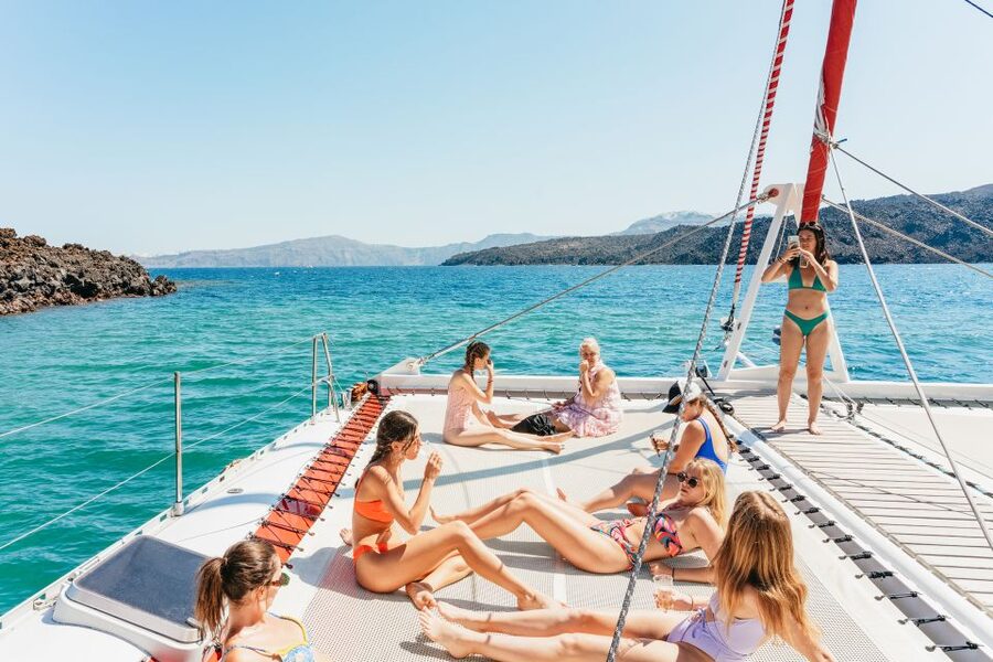Santorini: Catamaran Tour with BBQ Dinner, Drinks, and Music - What to pack for comfort