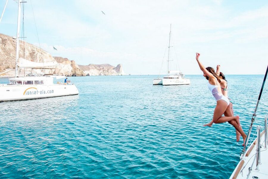 Santorini: Catamaran Tour with BBQ Meal and Unlimited Drinks - White Beach, lunch, and time to slow down