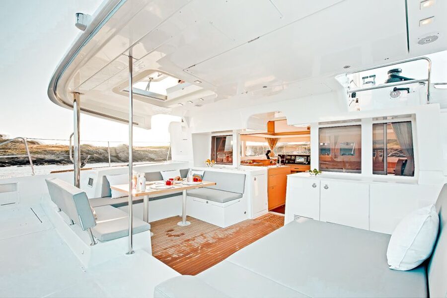 Santorini: Catamaran Tour with BBQ Meal and Unlimited Drinks - Red Beach and snorkeling from the boat