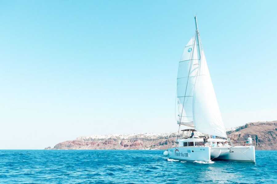 Santorini: Catamaran Tour with BBQ Meal and Unlimited Drinks - Food, drinks, and service on board