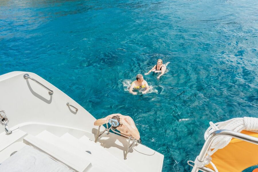 Santorini: Luxury Catamaran Day Trip with Meal and Open Bar - Red Beach and White Beach by boat