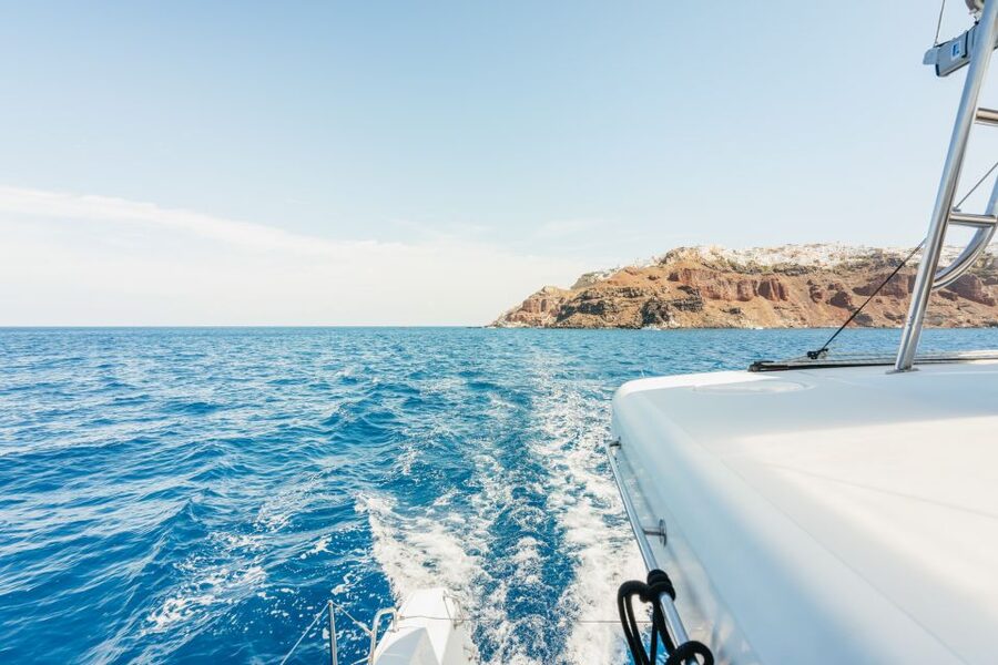Santorini: Luxury Catamaran Day Trip with Meal and Open Bar - How the crew handles wind and changing plans