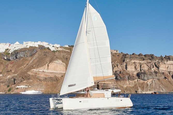 Santorini Platinum Catamaran Cruise with Meal, BBQ and Open Bar - Mesa Pigadia is the first real water stop