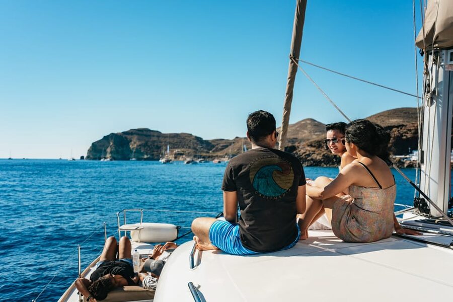 Santorini: Sailing Catamaran Cruise with BBQ and Drinks - Lighthouse, Indian Rocks, and the caldera