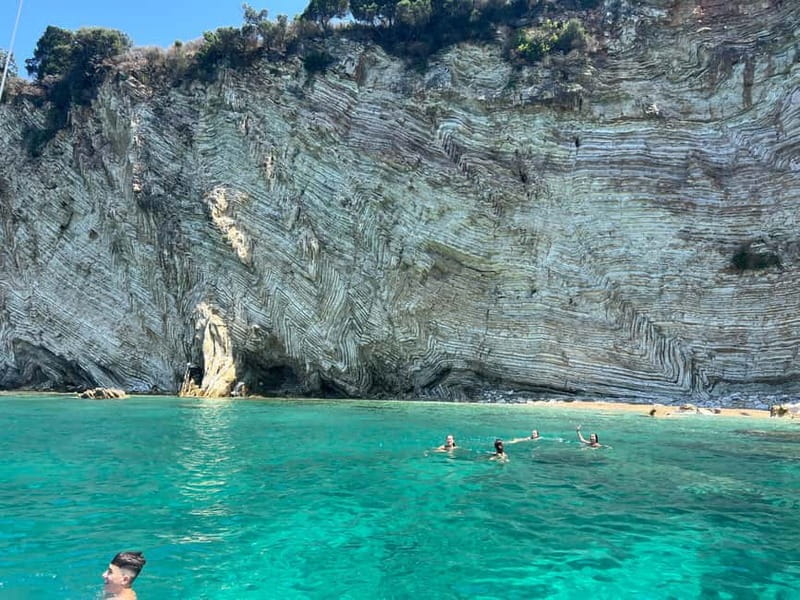 Saranda: Boat Tour to 7 Destinations with Beach Umbrella - Secret Beach and Turtle Cave are quick photo stops