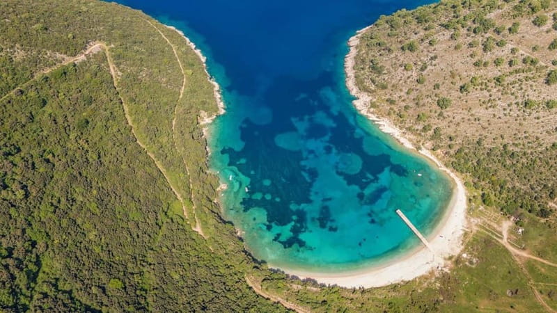 Saranda: Boat Tour to 7 Destinations with Beach Umbrella - What the captain adds to the day