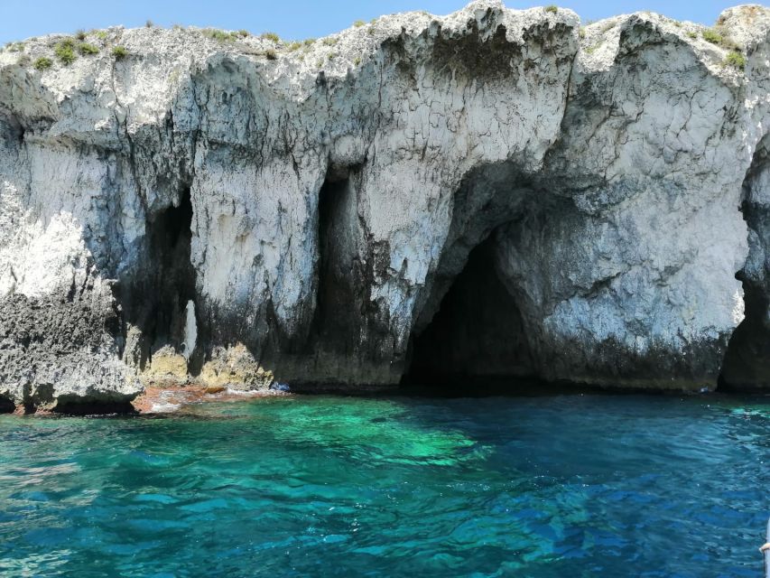 siracusa boat tour with visit to sea caves and ortigiaisland - Along Ortigia’s outer walls
