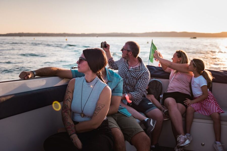 Sirmione: Sunset Boat Cruise with Local Wine - Thermal water and the old castle bridges