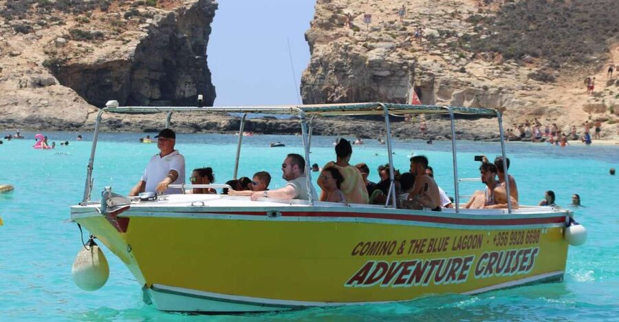 Sliema: Boat Trip to Comino Blue Lagoon, Gozo, and Caves - Crystal Lagoon: the first swim stop