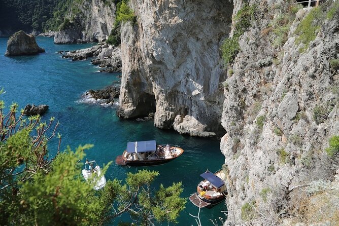 Small Group Boat Tour Capri & Blue Grotto with Swimming Stops - Swimming, snorkeling, and life on board