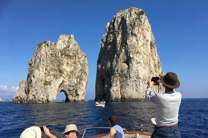 Sorrento: Capri Select Boat Trip with Swim, Drinks & Pick Up - What the small group adds